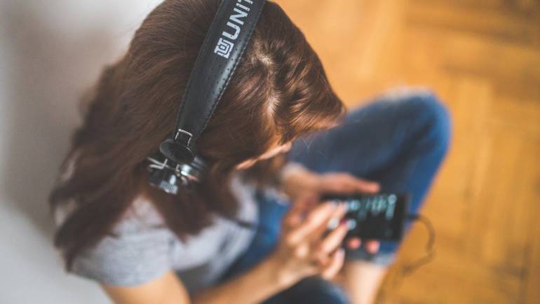 Top 10 Podcasts to end the Year Right…or develop a new addiction